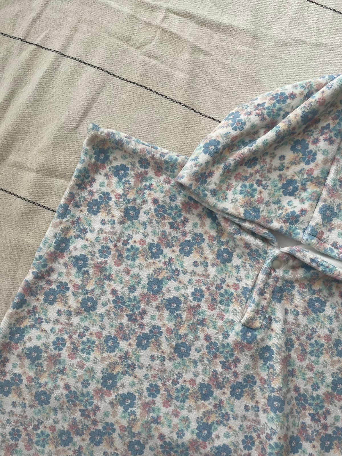 Poncho blue flowers